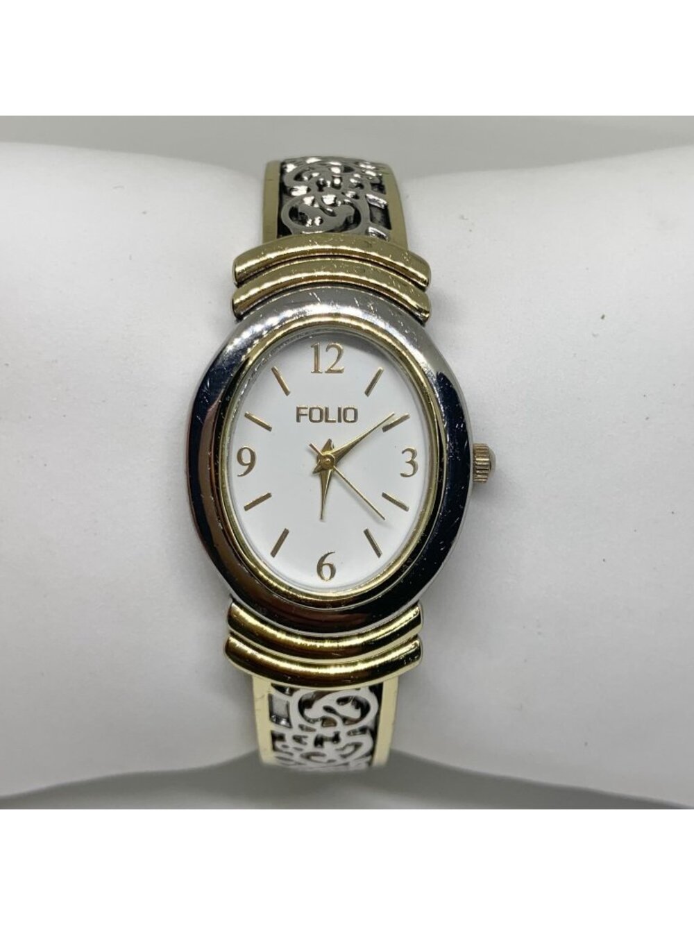 Folio gold silver tone women cuff bracelet watch 25mm oval quartz analog running